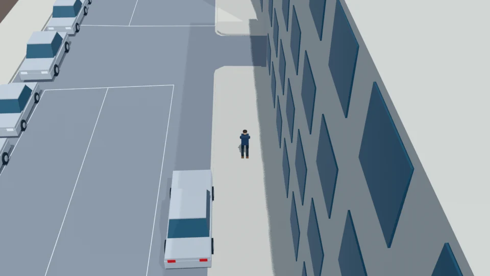 A pedestrian walks east along the south sidewalk while looking down at a phone.