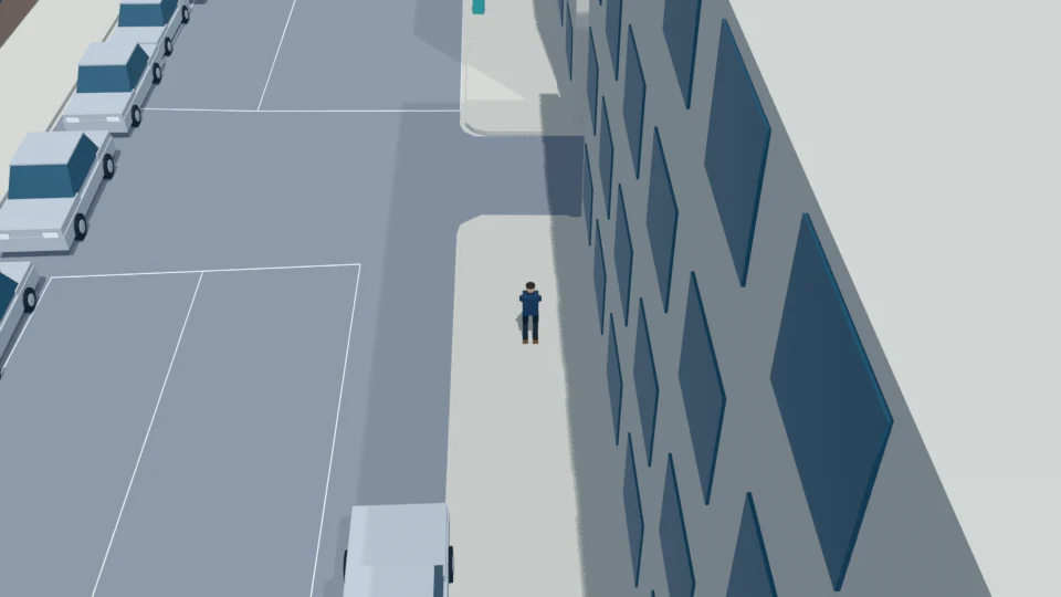 Still reading, the pedestrian begins drifting toward the roadway.